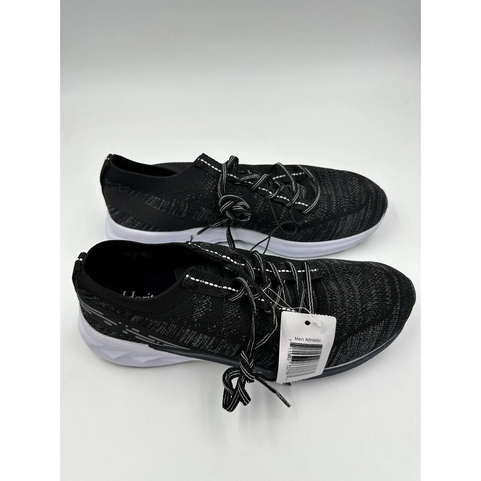 Men's Size 10, Black Slip-On Sneakers with Laces for a Secure Fit